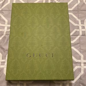 Empty Gucci box with wrapping. Box has a water mark. Used but great condition.